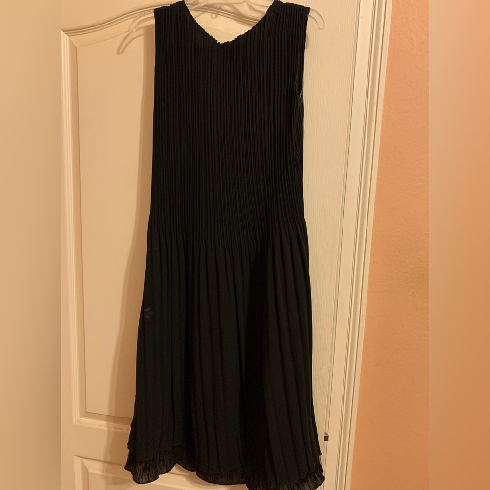 The cutest black tank dress with multiple textures.